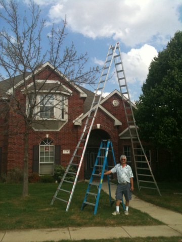 That big stepladder is 21 feet tall, the small one is 8 feet.